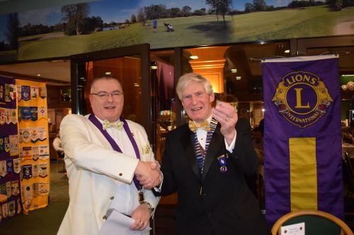 District Governor with Lion President Bill Walker